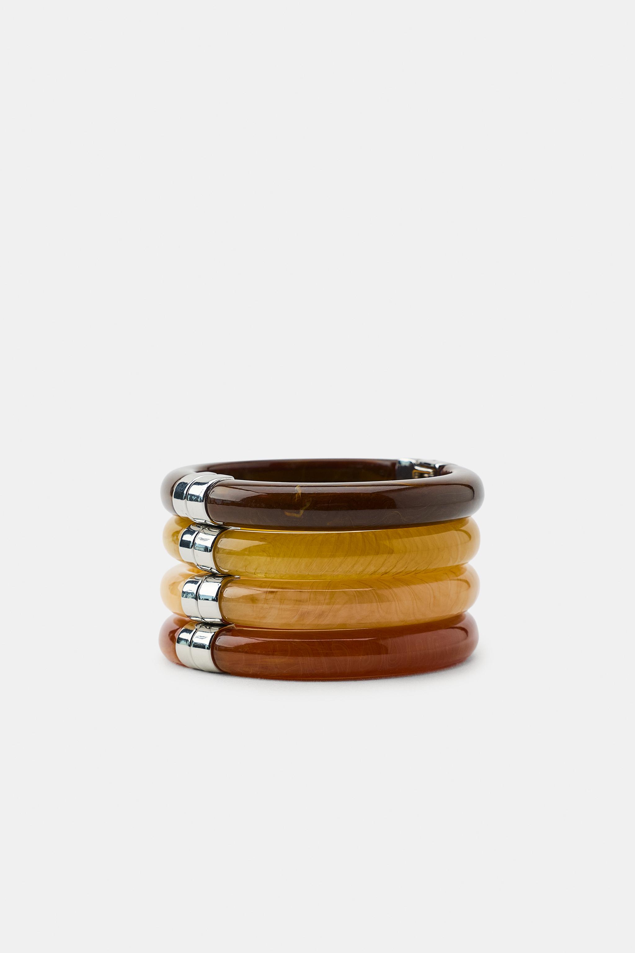 LOT DE 4 BRACELETS ARTICULÉS